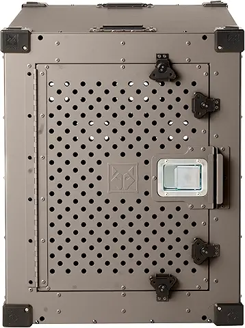 The empty Impact Indestructible High-Anxiety dog crate showcasing its heavy-duty welded aluminum walls, small round ventilation holes, and escape-proof latches