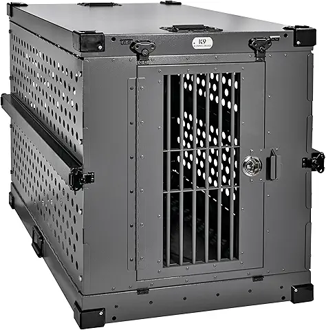 The empty K9 Kennel Boss heavy-duty aluminum dog crate showcasing its indestructible walls, ventilation slats, and smart security latch.